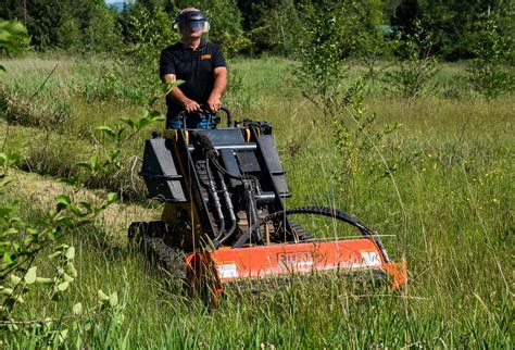 skid steer with mower attachment